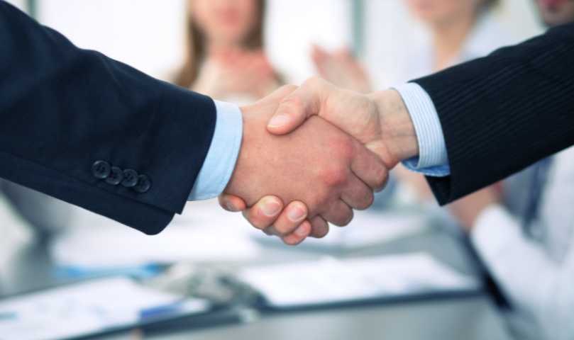 Handshake between two people